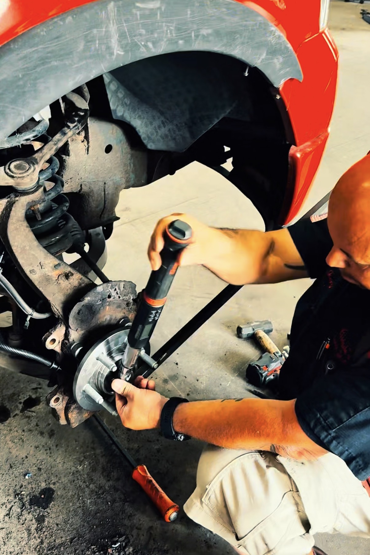 Technician performing brake service